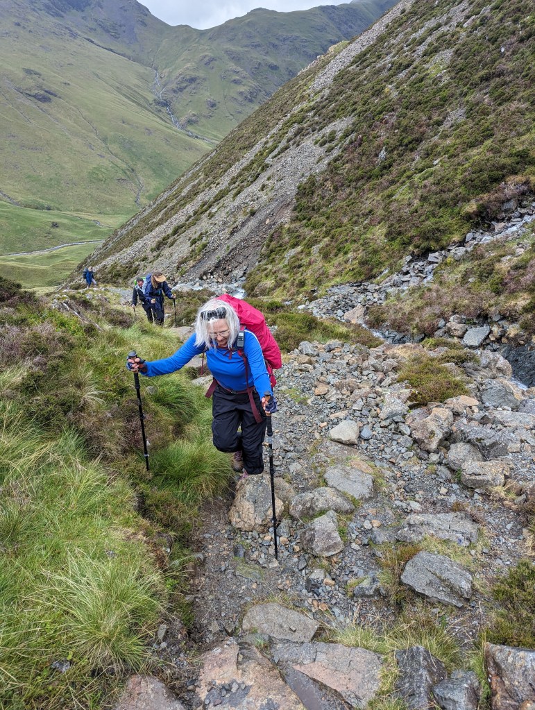 Hiker on steep rocks