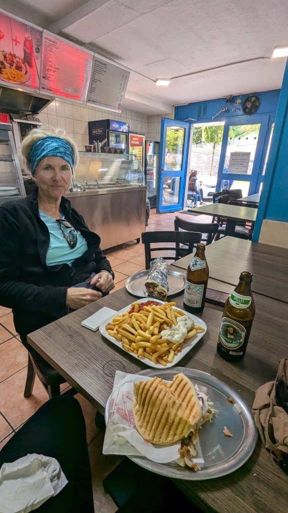 Kelly sitting in doner kebab restaurant