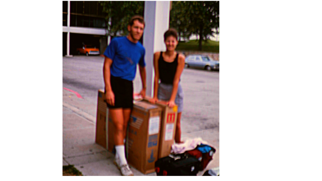 two people standing by bike boxes